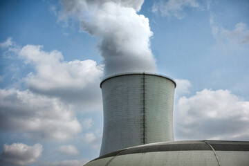 Towering Cooling Towers at Power Plant with Steam Plumes