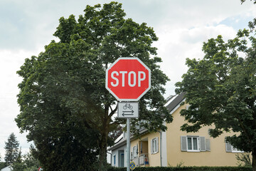 A STOP sign on a roadway within the city.