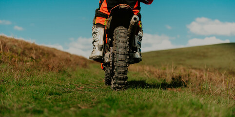 Professional enduro bike rider on action. Motocross sport.