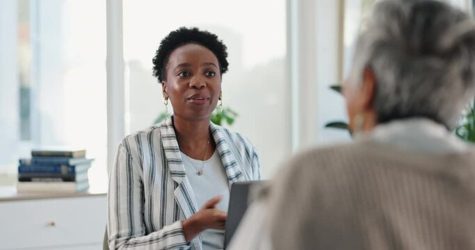 Business, woman and conversation in office for meeting with management consultant, collaboration and client interaction. Women, discussion and communication for problem solving and corporate strategy