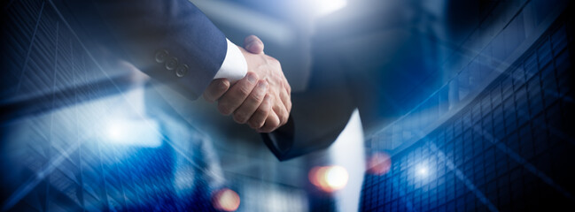 Businessman handshake for teamwork of business merger and acquisition,successful negotiate,hand shake,two businessman shake hand with partner to celebration partnership and business deal concept
