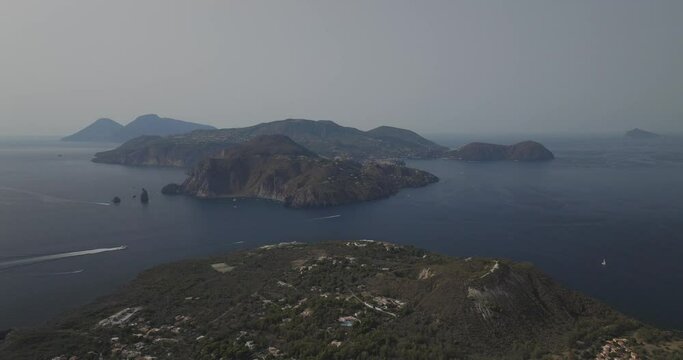 Aerial view of Vulcano Island with Lipari in background, Sicily, Italy.