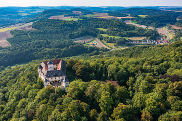 Naklejka premium A bird's eye view of the idyllically situated Greifenstein Castle near Heiligenstadt in Franconian Switzerland