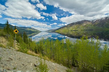landscape with lake and mountains in yukon