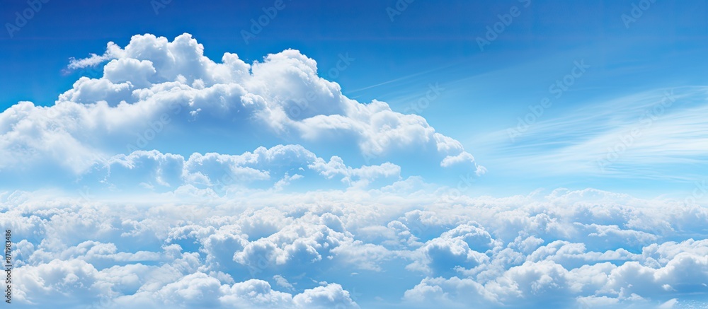 Poster The blue sky transitioning with white clouds can be incorporated as the backdrop with copy space image.