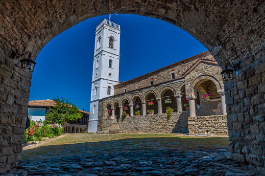 A view through the entrance arch towards the Ardenica Monastery in Albania in the morning in summertime