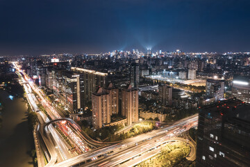 Fototapeta premium Vibrant Nighttime Cityscape with Busy Streets