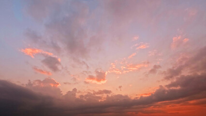 Fototapeta premium beautiful sunset goldish clouds on the sky background - photo of nature