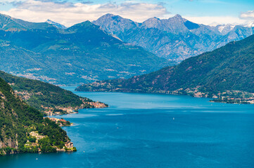 Panorama of Lake Como, photographed from the village of Croce, with the town of Menaggio and the mountains above it.