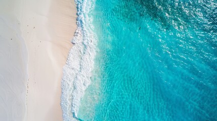 Aerial View of Turquoise Ocean Waves Crashing on White Sandy Beach - Pristine Coastal Landscape