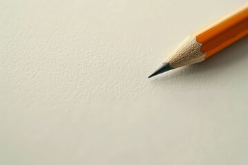 Sharpened orange pencil tip close-up