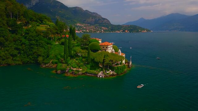 Aerial view of the luxury Villa Balbianello with terraced gardens, on the rocky wooded peninsula of Lavedo on Lake Como, panorama, picturesque residence. Green Planet. Nature. Lenno Italy 12.07.2024