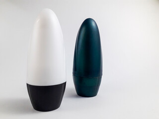 White and pearl green plastic roll on bottle isolated on white background. Roll on deodorant packaging