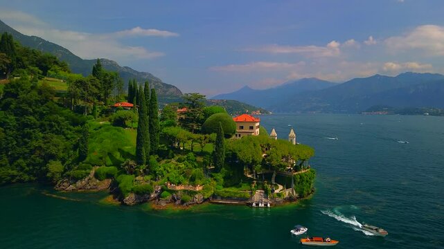 Aerial view of the luxury Villa Balbianello with terraced gardens, on the rocky wooded peninsula of Lavedo on Lake Como, panorama, picturesque residence. Green Planet. Nature. Lenno Italy 12.07.2024