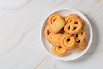 Set of danish butter cookies macro cutout. Five whole pretzel, round and rectangular shortbread biscuits with sugar