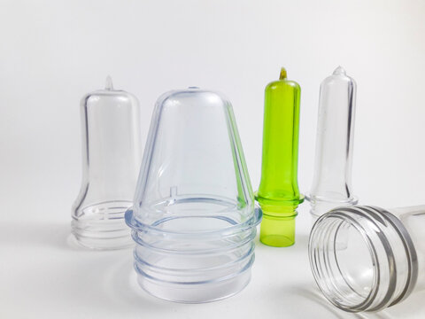PET preform isolated on a white background, is plastic that is the result of injection before the blow molding process in making PET bottles