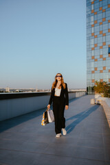 Fototapeta premium Woman Shopping on Rooftop