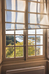 A glimpse of autumns embrace from a french window