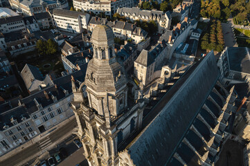 A birds eye view of a historic church tower in france