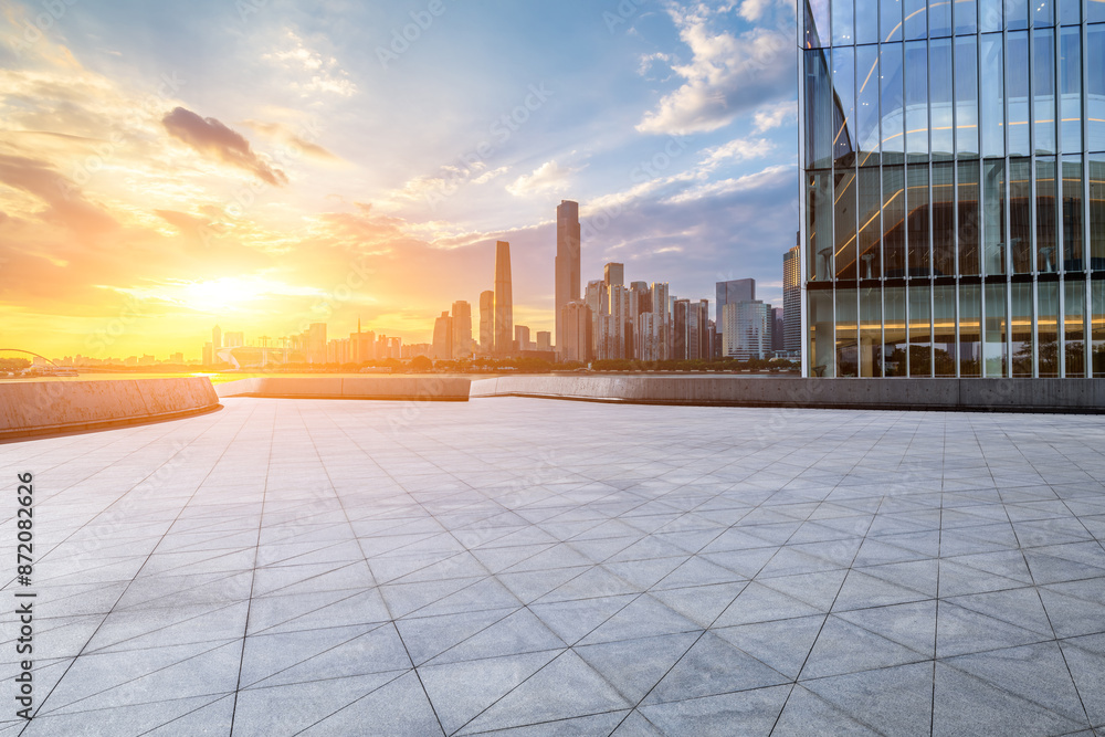 Sticker empty square floor with modern city buildings scenery at sunset in guangzhou. car advertising backgr