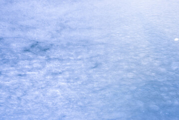 Natural texture of ice, frozen lake  as  background.