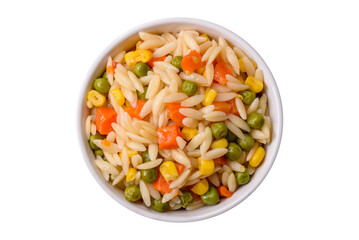 Delicious boiled rice with vegetables corn, carrots, peas with salt