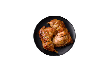 Delicious grilled chicken leg or quarter with salt and spices