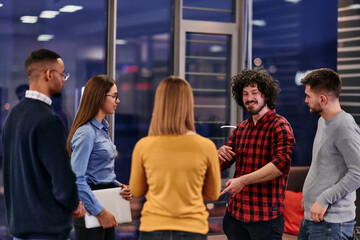 Multicultural Business Team Brainstorming During Coffee Break