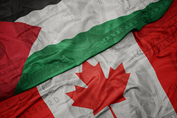 waving colorful flag of palestine and national flag of canada on the dollar money background....