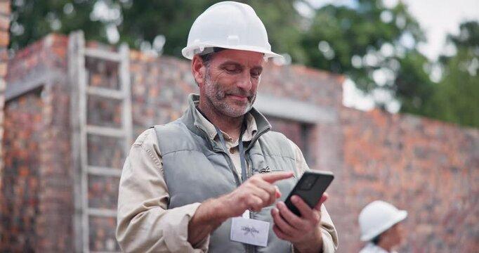 Man, architect and phone at construction site for smile, contact and approval from city board for expansion. Mature contractor, person and happy on smartphone, email and deal for urban development