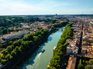 Fototapeta premium Aerial photo with drone over the Tiber River on the border with Trastevere in Rome Italy