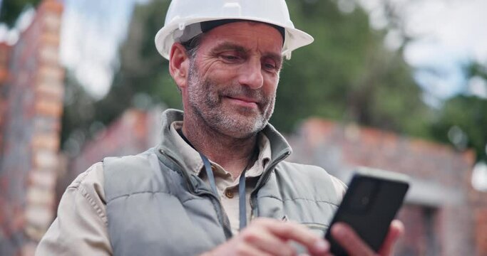 Man, architect and phone at construction site with texting, contact and approval from city board for expansion. Mature contractor, person and happy on smartphone, email and deal for urban development