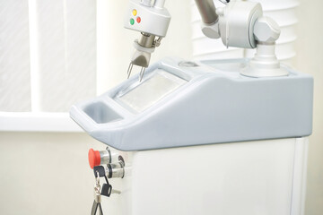 Face procedure device. Professional dermatologist uses modern technology for laser hair removal, or...