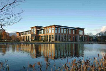 Fototapeta premium Modern Office Building by the Lake