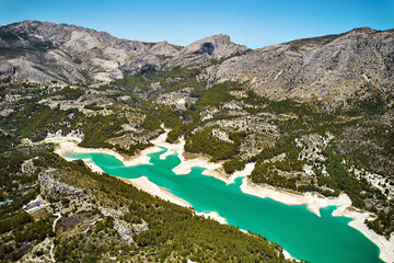 Aerial shot of Guadalest Reservoir and surrounded mountains