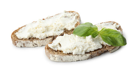 Delicious bruschettas with ricotta cheese and basil isolated on white