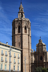 Fototapeta premium Church tower and residential buildings in Valencia, Spain