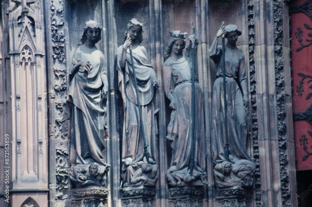 Wall mural Statues at left portal of Strasbourg Cathedral in Alsace