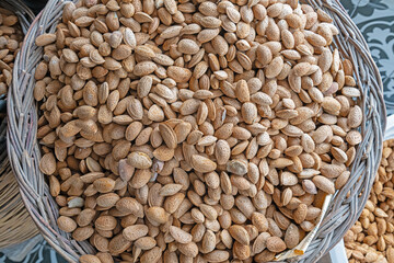 Shelled almonds in a basket. Dried fruits in the market. Turkish fruit market.