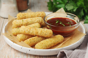 Mozarella sticks with barbeque sauce	