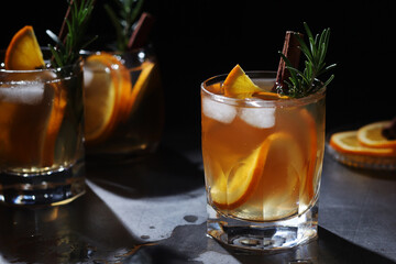 Orange rosemary bourbon cocktail in low key
