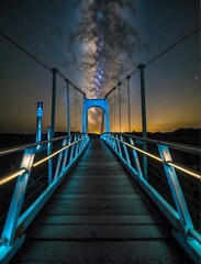 Milky Way over a bridge AI.