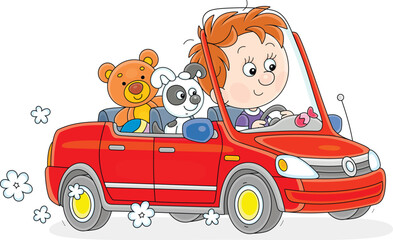 Happy little boy driving a beautiful red car with his funny toy passengers, vector cartoon illustration isolated on a white background