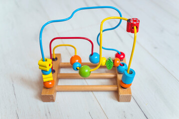 Wooden toy for kids. Bead Maze Roller 