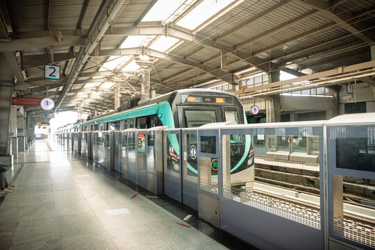 Picture of Noida Metro or Noida Metro Rail Corporation And It's Campus. Noida metro arriving at the metro station in Noida, Uttar Pradesh, India.