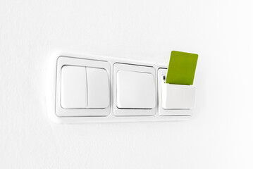 Hotel key card reader with card for powering electricity.