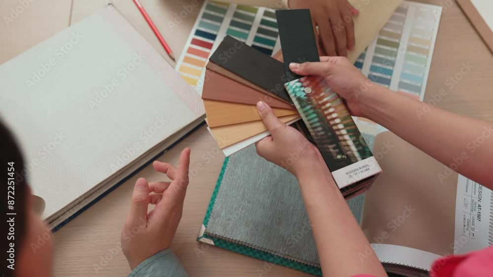 Poster slow motion hand closeup architect and interior designer presenting textile material and color from 