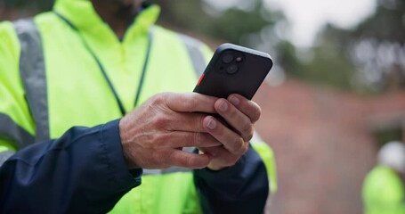 Hands, construction worker and man with smartphone, typing and social media with online reading. Closeup, person or engineer with cellphone, safety vest and check schedule for calendar or digital app