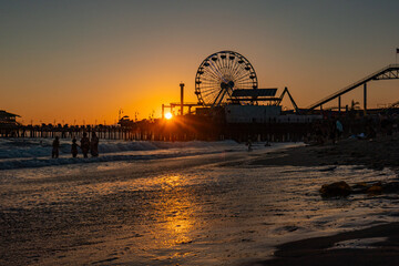 Sun Sets Behind Ocean Pier