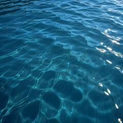 Rippling blue water surface with light reflections